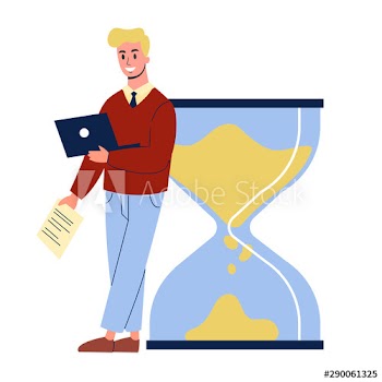 Businessman standing at the big hourglass