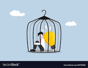 businessman stuck in cage with bright light bulb