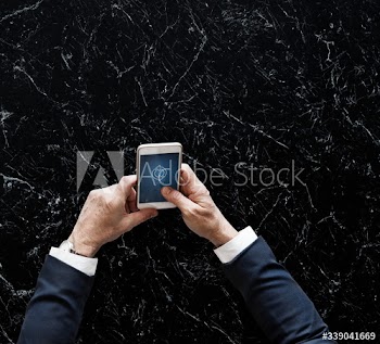 Businessman syncing data online