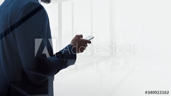 Businessman texting