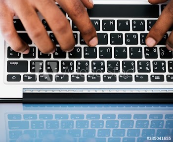 Businessman using a laptop at work