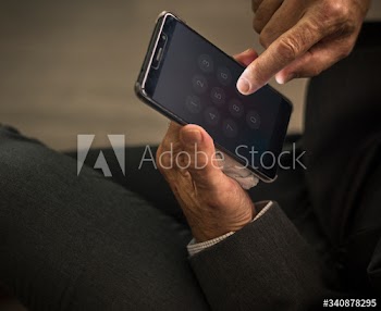 Businessman using his mobile phone