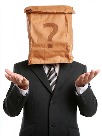 Businessman with Brown Paper Bag Question Mark