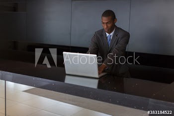 Businessman working at laptop