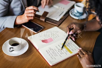 Businesspartners meeting at a cafe