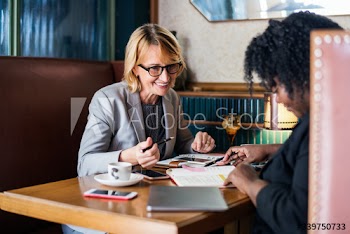 Businesspartners meeting at a cafe