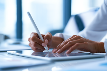 Businesswoman Signing Digital Contract on Tablet