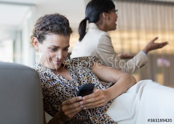 Businesswoman using mobile phone
