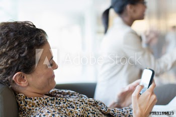 Businesswoman using mobile phone