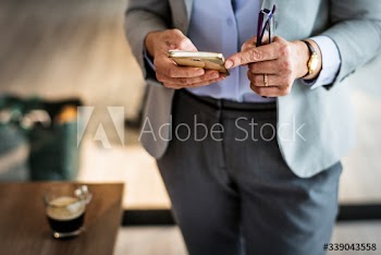 Businesswoman working remotely from a cafe
