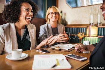 Businesswomen discussing and having fun