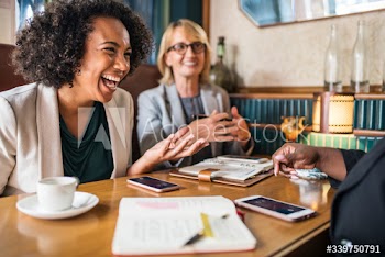 Businesswomen discussing and having fun