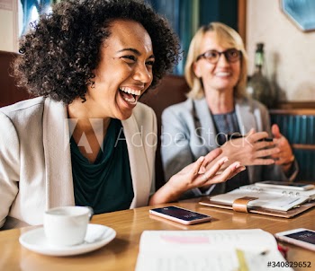 Businesswomen discussing and having fun