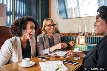 Businesswomen discussing and having fun
