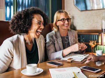 Businesswomen discussing and having fun