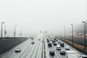 Busy Freeway In The Fog