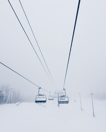 cable cart coated with snow