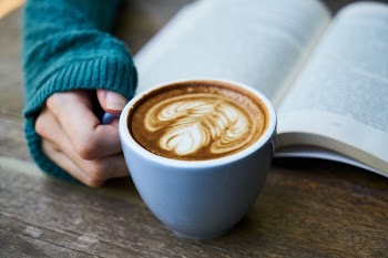 Cafe Latte Beside Book
