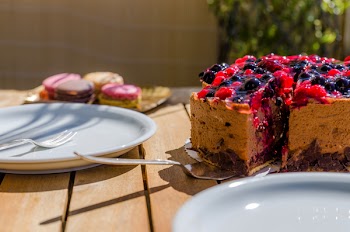 Cake Near White Ceramic Plate on Brown Wooden Table
