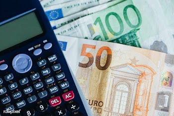 Calculator and Euro banknotes on a table | Free  photo - 2353693