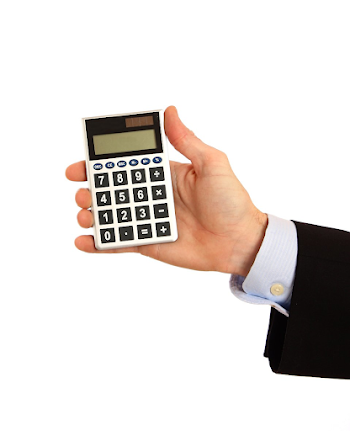 Calculator | Free Stock Photo | A hand holding a calculator | # 13259
