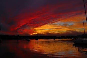 Calm Body Of Water During Golden Hour