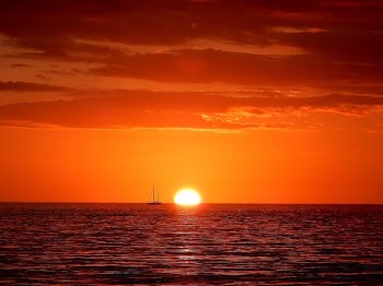 calm body of water during golden hour