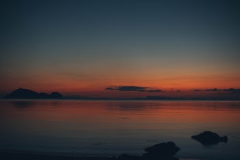Calm Body of Water during Nighttime