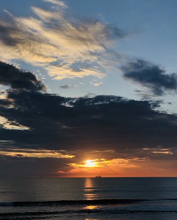 Calm Body of Water during Sunset