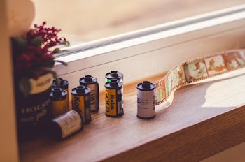 Camera Films on Window Sill