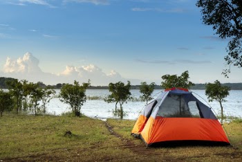 Camping  Dome Tent Near a Body of Water