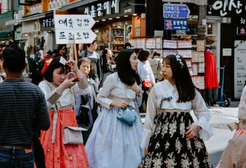 Candid shot of this 3 friends wearing traditional Korean dress in Seoul. 

Submitted for the International Women’s Day 2019 Collection.