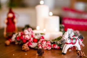Candles and Toys on Top of Table