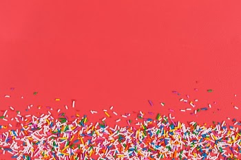 Candy Sprinkle Red Background