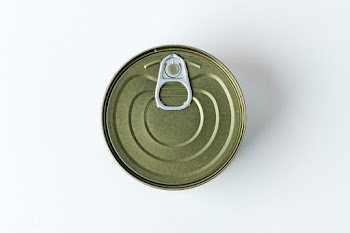 Canned fish on a white background | Free  photo - 2297443