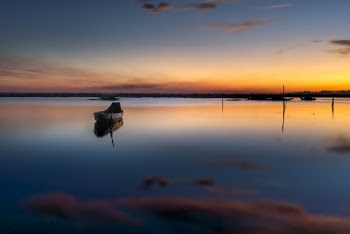 Canoe in Body of Water