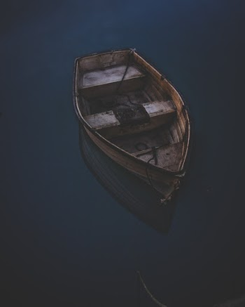 Canoe on Body of Water