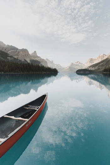 Canoe on Lake in Mountains