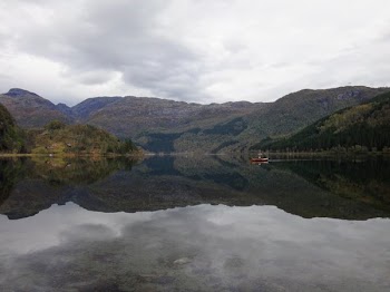 Canoe Over Glassy Lake