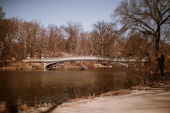 canoe passing under rhe Bridge