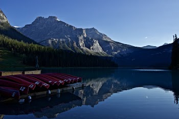 Canoes On Wooden Dock