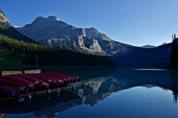 Canoes On Wooden Dock