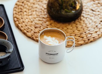 cappuccino in white starbucks mug