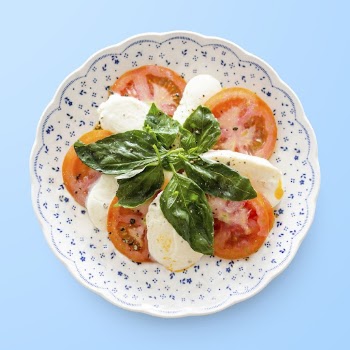 Caprese salad on plate, food | Free PSD - rawpixel