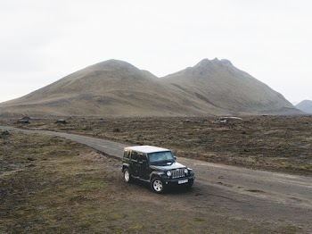 Car Parked Near Mountain