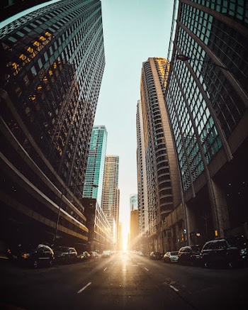 Cars Between High Rise Buildings