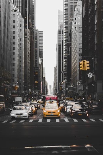 cars in between buildings
