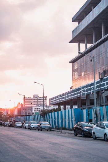 Cars Parked In Front Of The Building