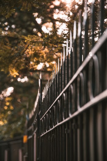 Cast iron fence and gate protecting an embassy.