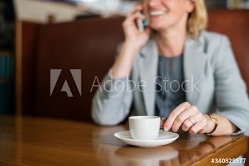 Casual woman is talking on the phone